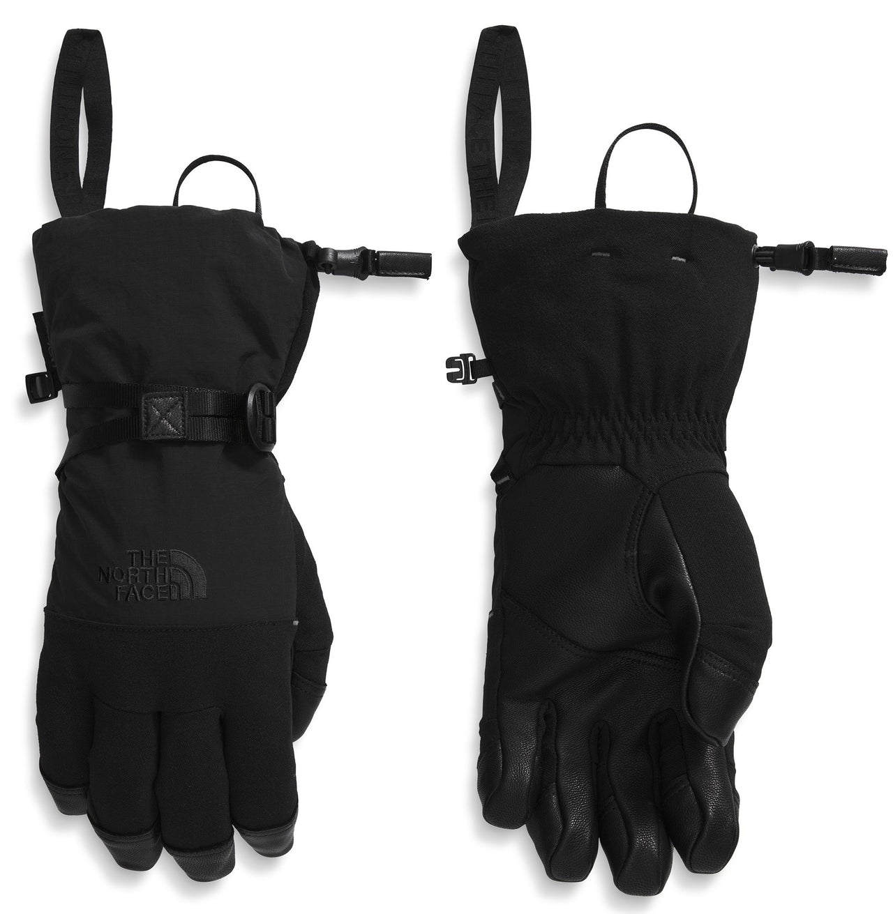 A pair of black ski gloves, one showing the front with wrist strap and embossed logo, and the other showing the back with leather palm.