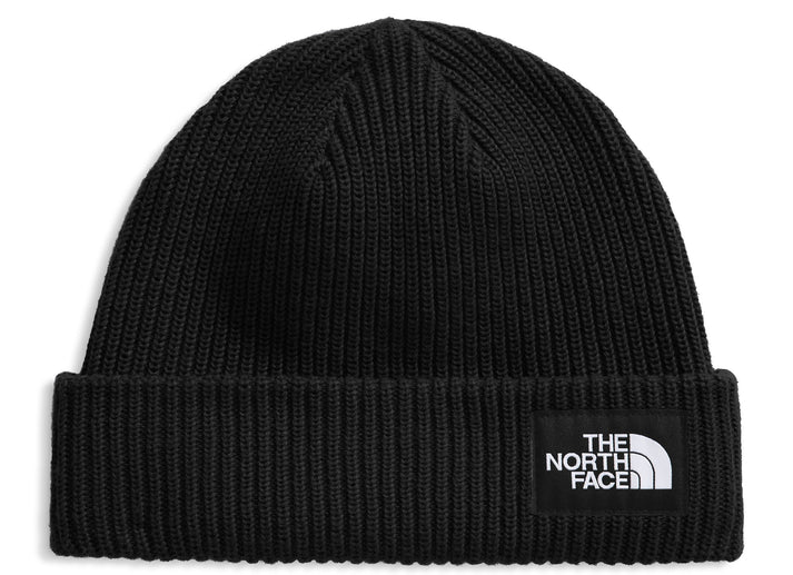 Black knit beanie with logo that says "THE NORTH FACE" in white.