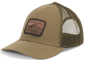 Khaki trucker hat with mesh back, a tan brim and front panel, and a brown patch with "Best Served Chilled THE North Face Established in 1966" printed on it.