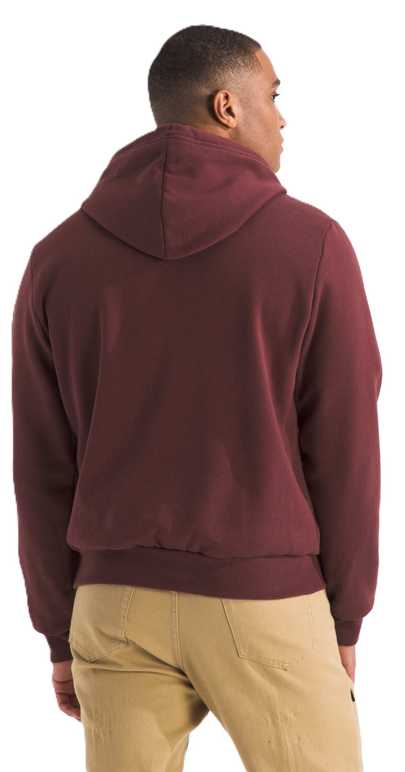 A person from the rear wearing a maroon hooded sweatshirt and tan pants.