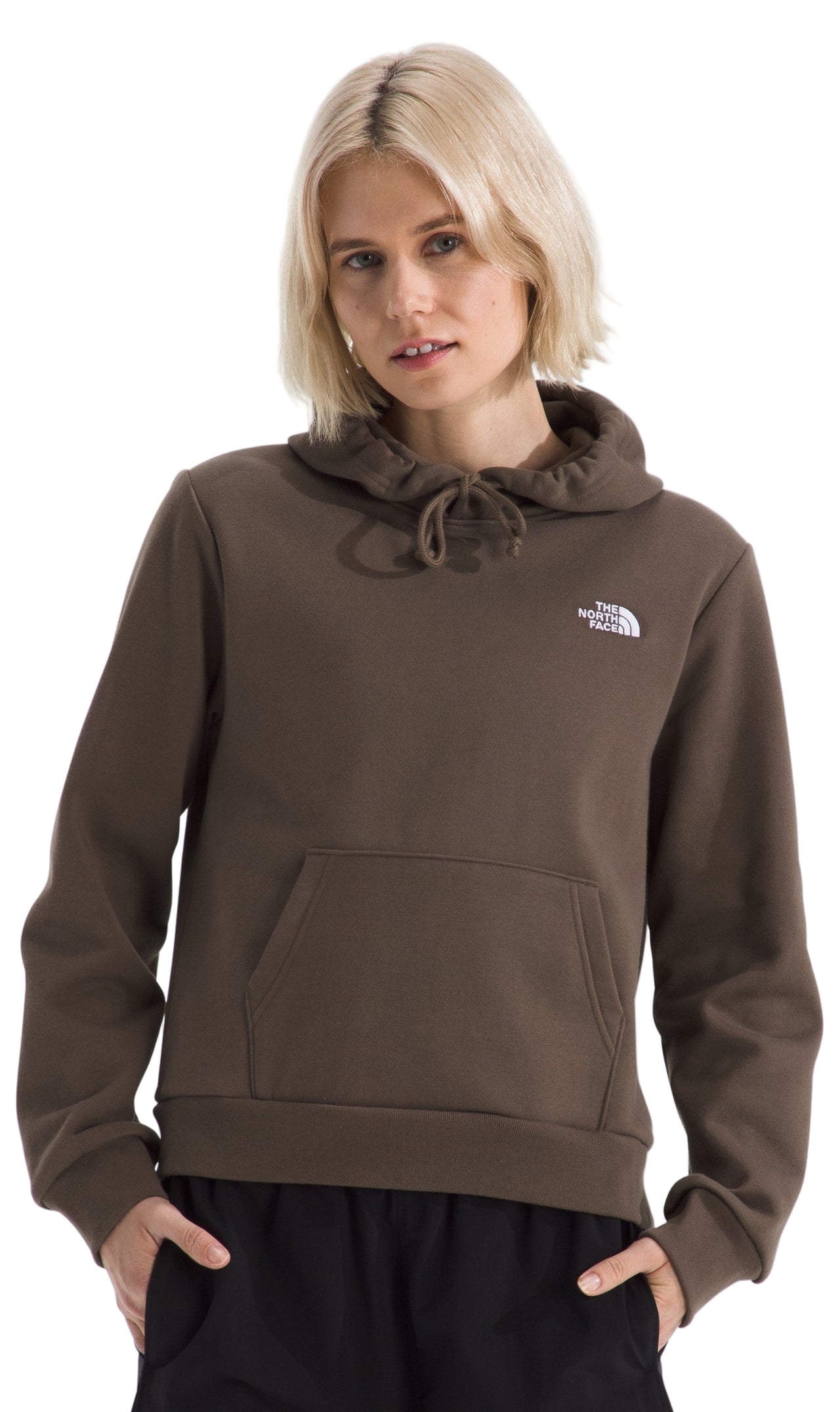 Woman wearing a brown hooded sweatshirt with drawstrings and a kangaroo pocket.