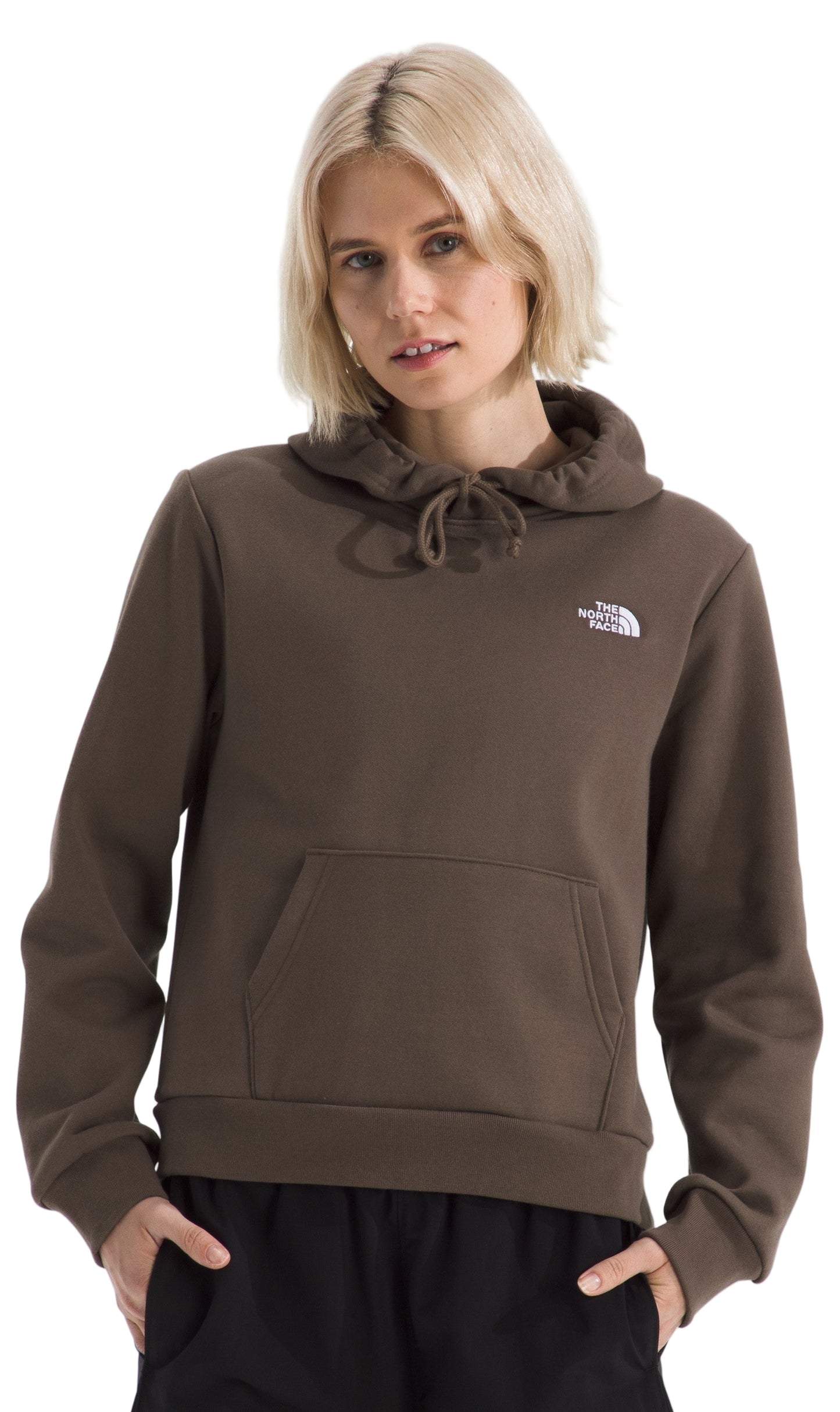 Woman wearing a brown hooded sweatshirt with drawstrings and a kangaroo pocket.