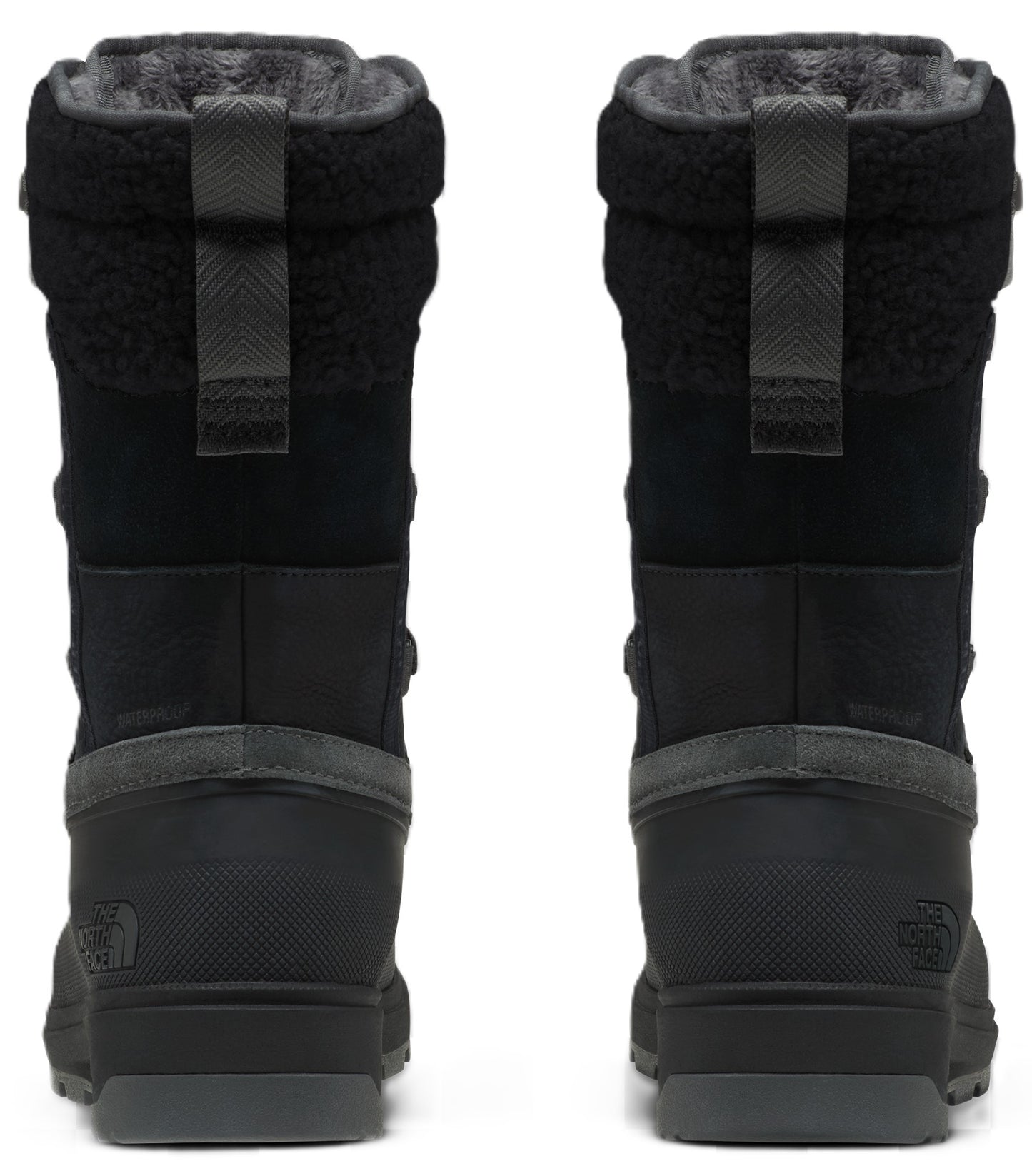 A pair of black, mid-calf winter boots viewed from the back, featuring a textured heel, a gray midsole, a pull tab at the collar, and a plush fleece lining.