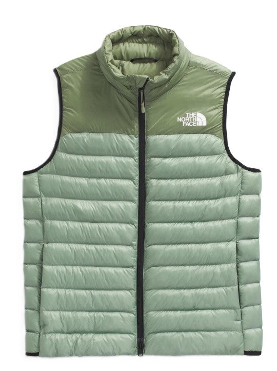 Green and olive green puffer vest with black trim and The North Face logo on the chest.