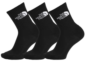 Three black socks with a white logo reading "THE NORTH FACE".