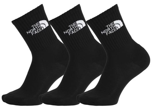 Three black socks with a white logo reading "THE NORTH FACE".