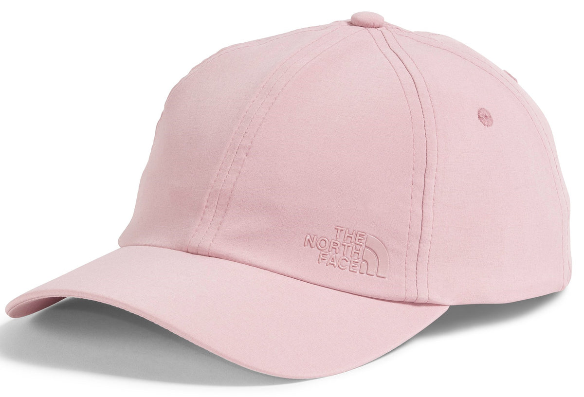 Light pink baseball cap with tonal logo on the front panel.