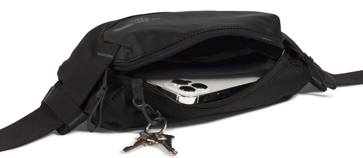 Black hip bag with a phone and keys.