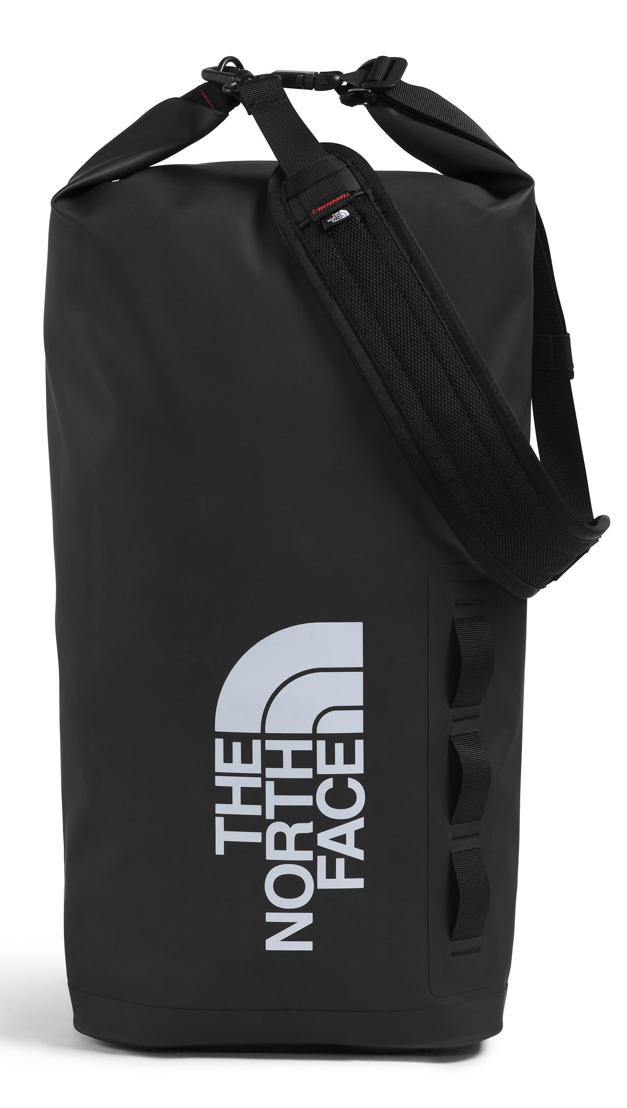A black duffel bag with a large, vertical, white logo on the side, a shoulder strap, and a top handle.