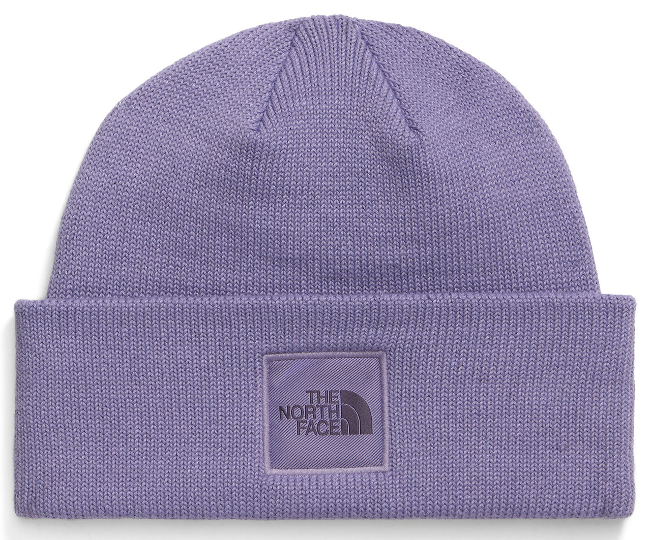 A light purple, knit beanie with a folded cuff and a square, light purple logo patch centered on the front that features the text THE NORTH FACE.