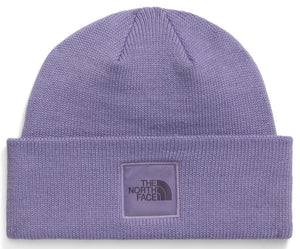 A light purple, knit beanie with a folded cuff and a square, light purple logo patch centered on the front that features the text THE NORTH FACE.