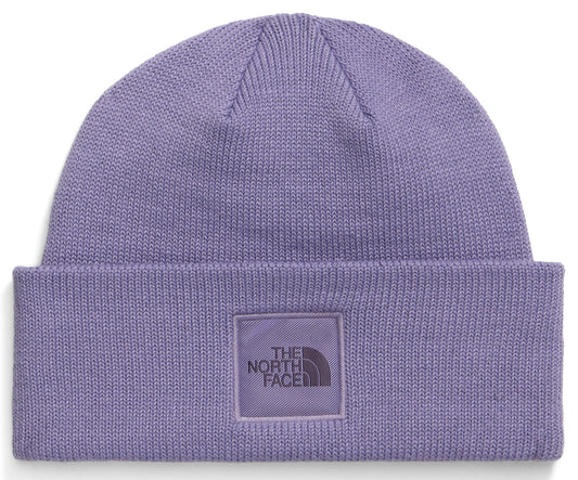A light purple, knit beanie with a folded cuff and a square, light purple logo patch centered on the front that features the text THE NORTH FACE.