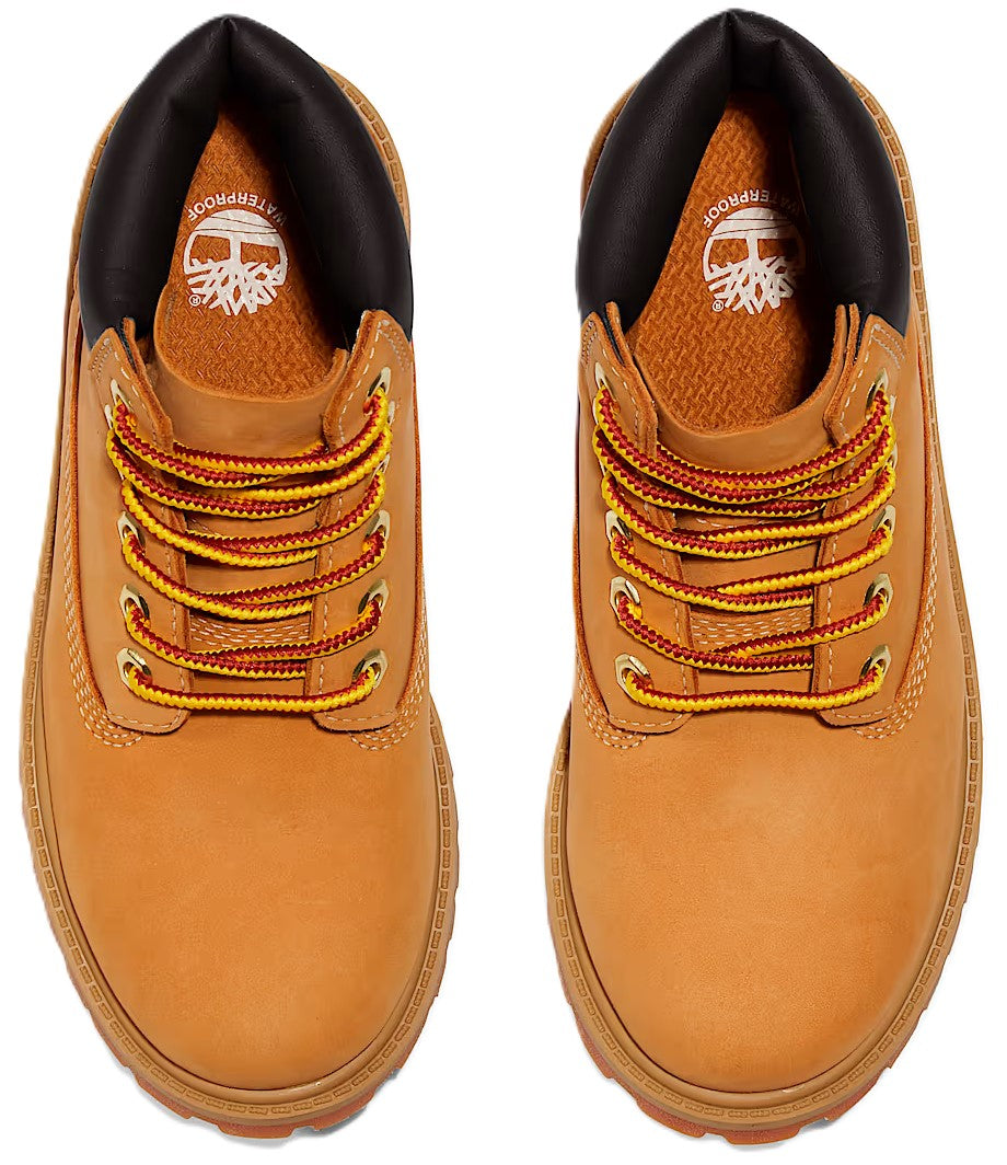 A pair of tan, waterproof nubuck leather boots from an overhead perspective, featuring a black padded collar, gold-tone metal eyelets, and two-toned yellow and brown laces.