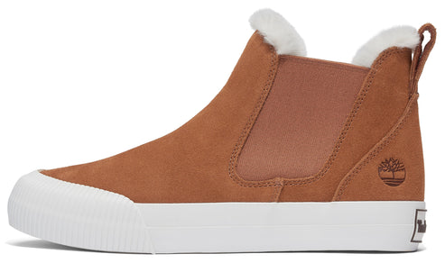 Low top sneaker with light brown suede, a white toe cap, white soles, and faux-fur lining the ankle.