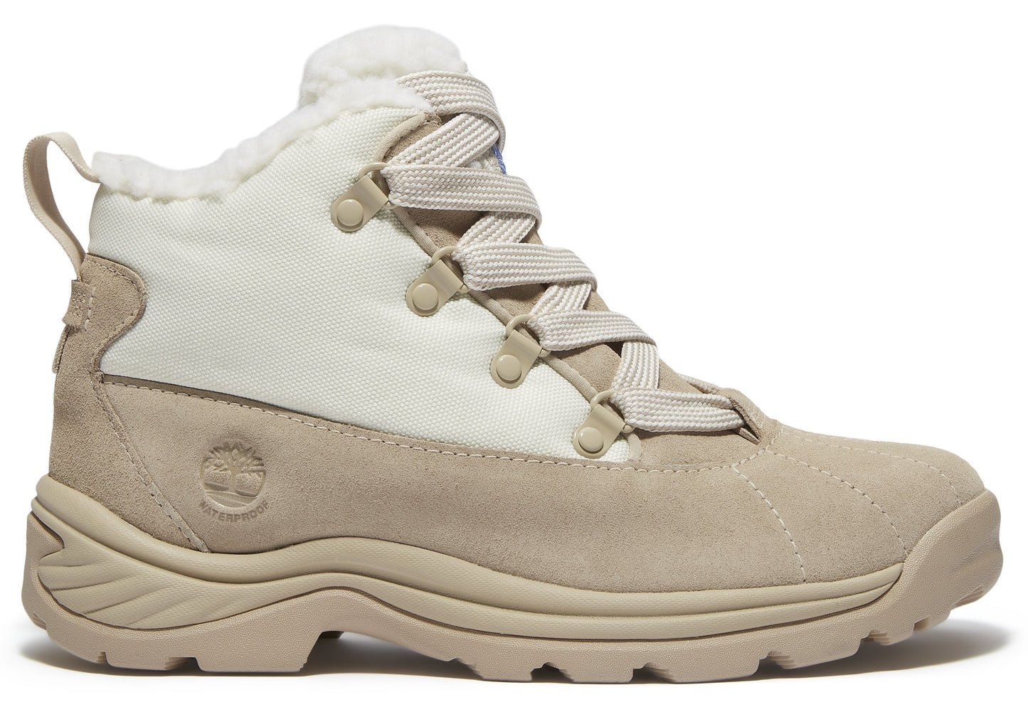 Beige suede boot with white canvas shaft and faux fur lining.