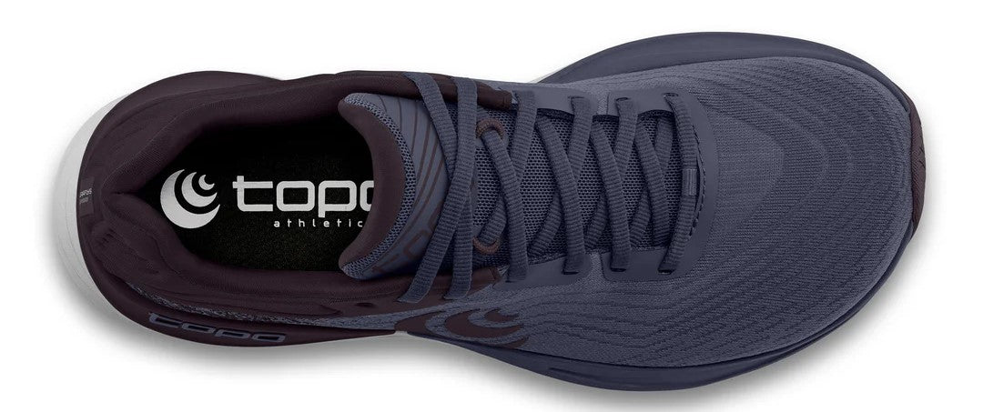 Overhead view of a blue running shoe with laces.