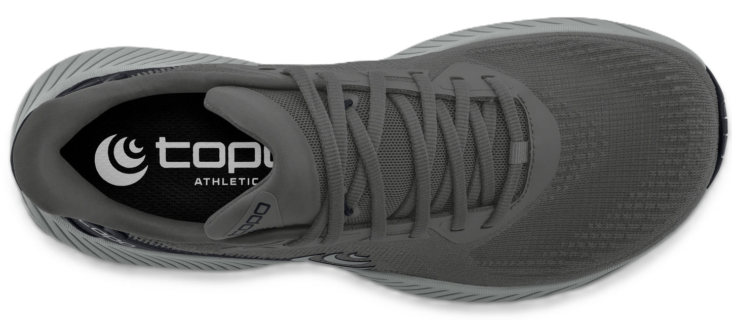 A grey running shoe, showing the laces and insole with the text "topo athletic".
