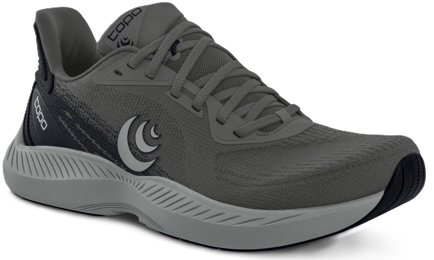 A gray running shoe with gray laces and a white logo on the side.