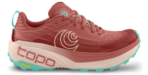 Running shoe with a rust-colored upper, a thick white midsole with 'topo' on the side, and a teal outsole and accent.
