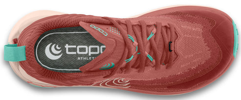Overhead shot of a running shoe with a red upper, teal accents, and visible lacing system.