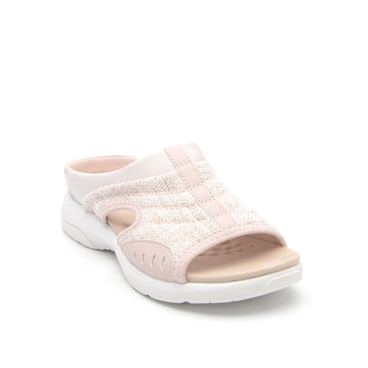Slip-on pale pink sandal with white sole and small cutouts on the side.
