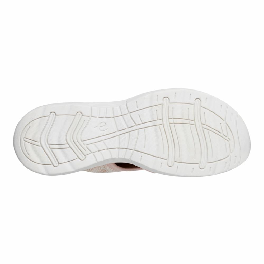 White shoe sole with curved tread lines.