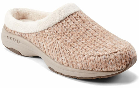 A cozy tan slip-on shoe with a thick sole and faux fur trim.