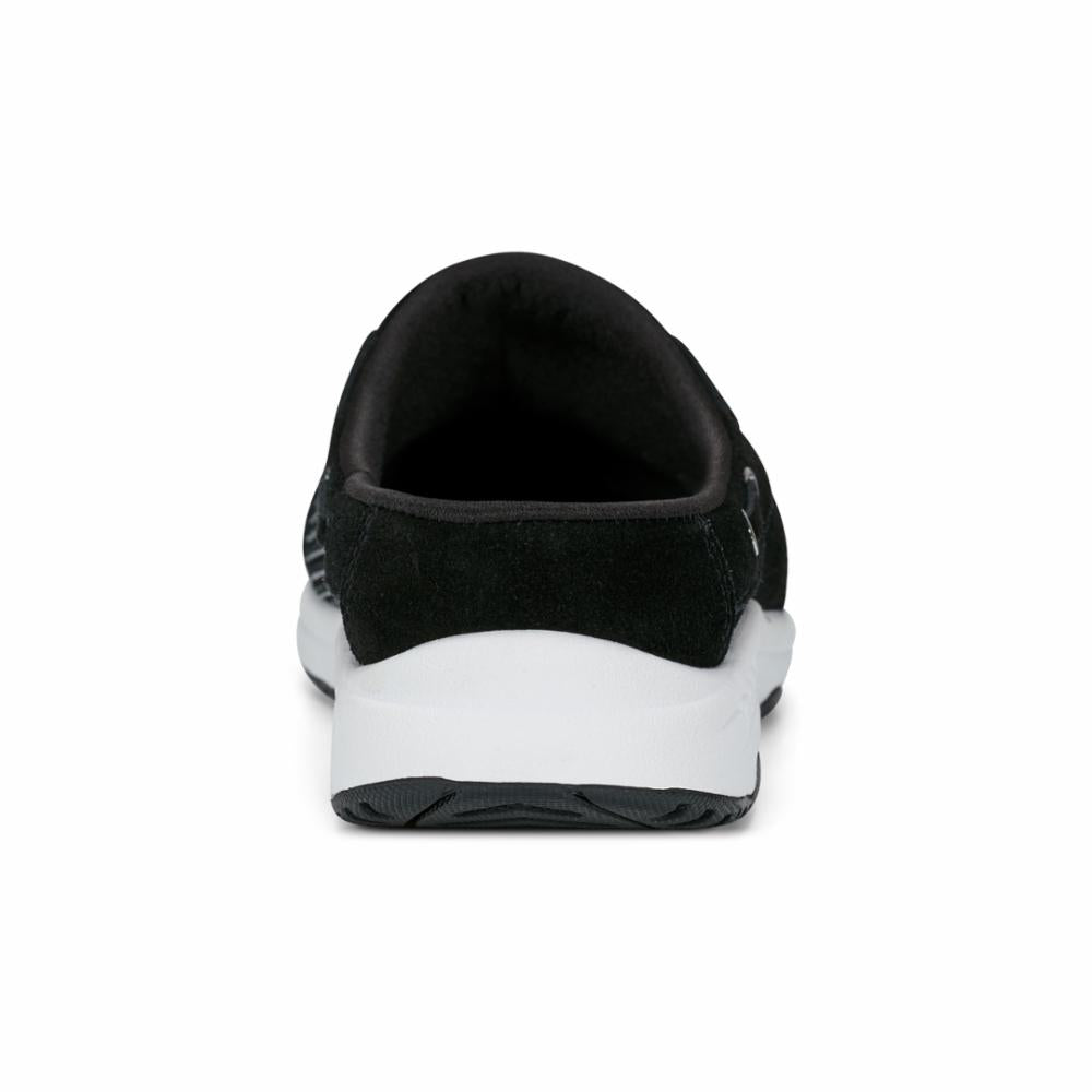 Black clog with white sole, rear view.