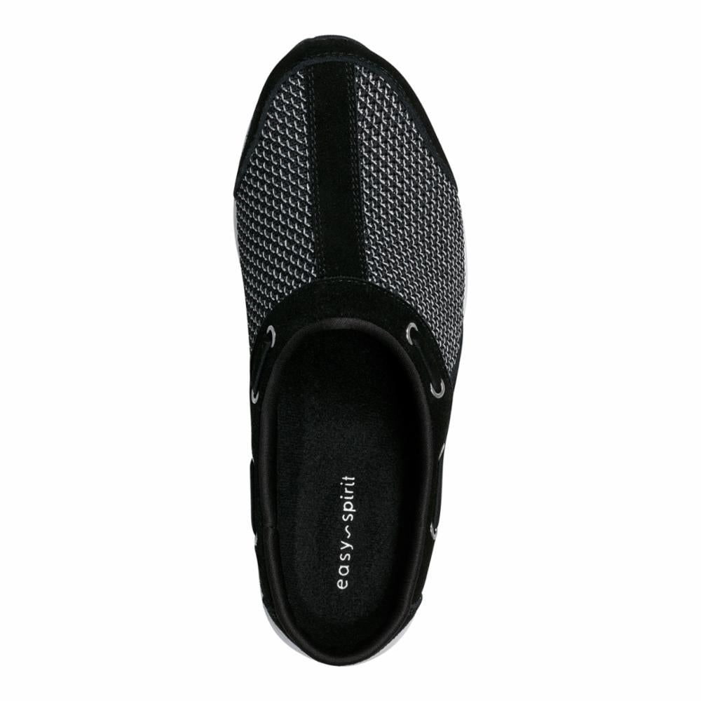 Overhead view of a black slip-on shoe with mesh and suede accents. "easy spirit" is printed on the insole.