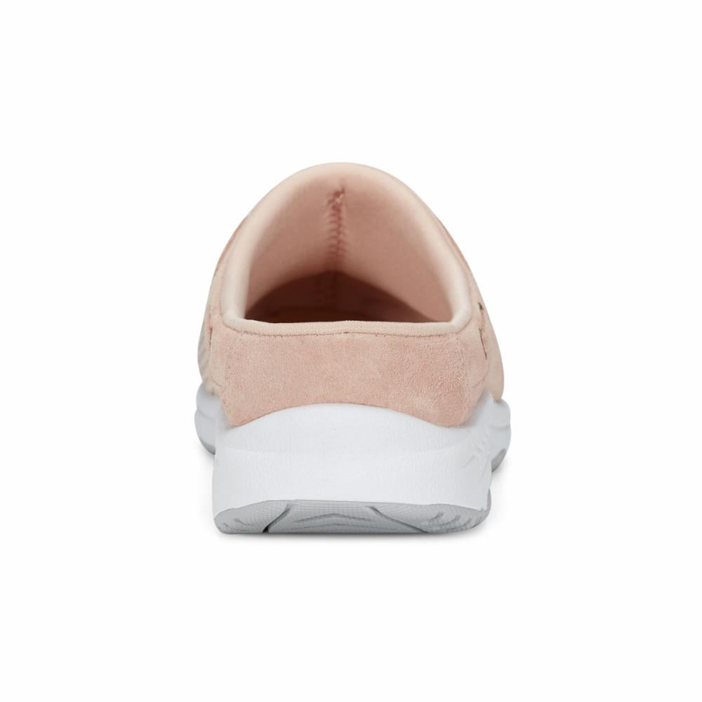 Light pink floral print clog with white sole, back view.