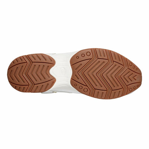 Bottom view of a shoe with a brown sole with a chevron pattern.