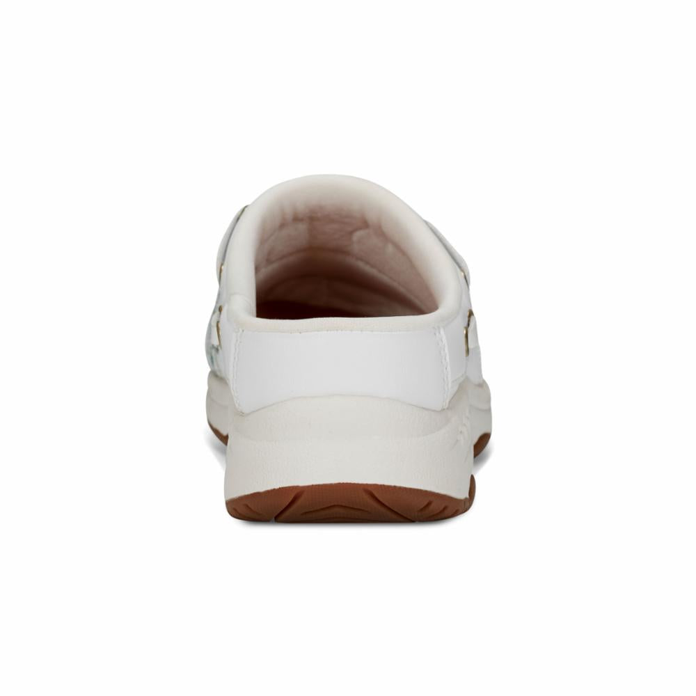 White slip-on shoe with a brown sole, back view.