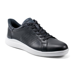 A black leather sneaker with perforations and a white sole.
