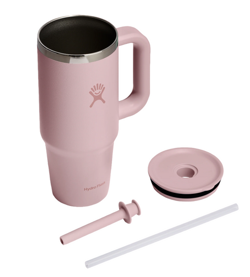 A pink, handled, stainless steel mug with a lid and straw.