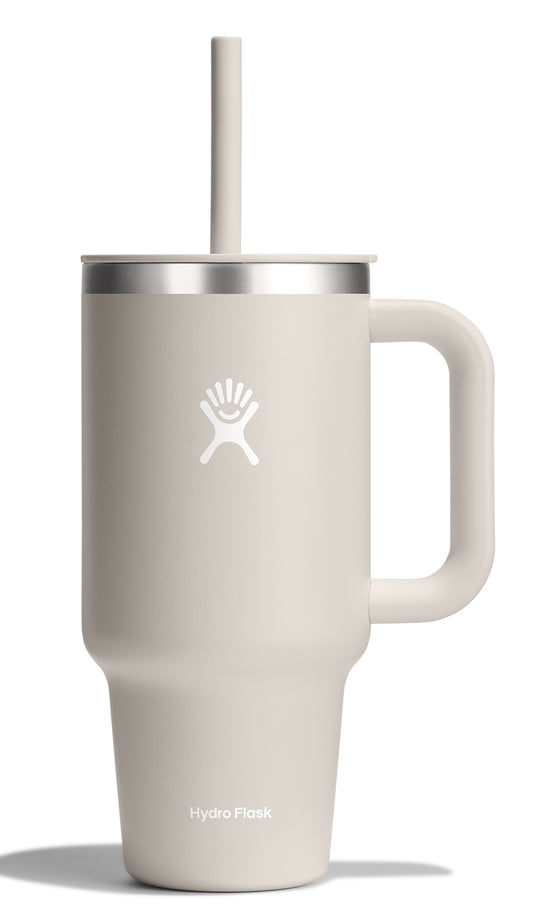 Beige insulated mug with handle and straw.