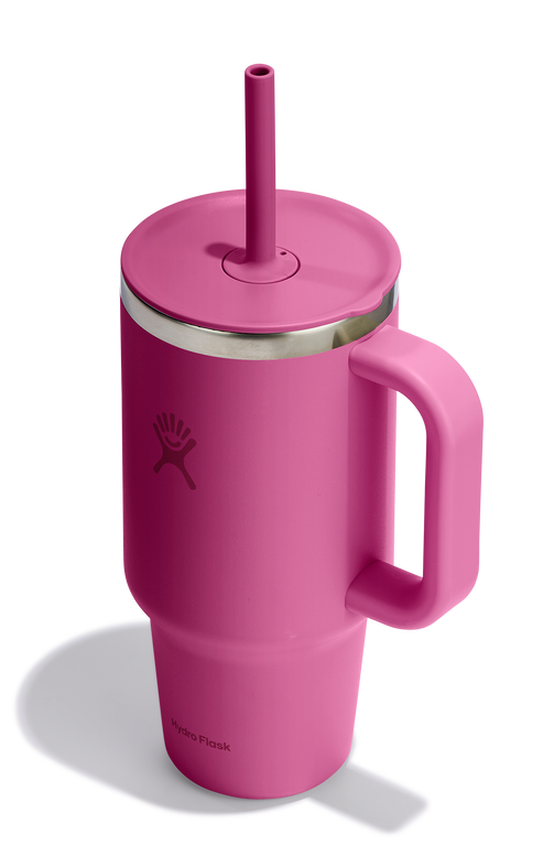 Pink stainless steel tumbler with handle and straw.