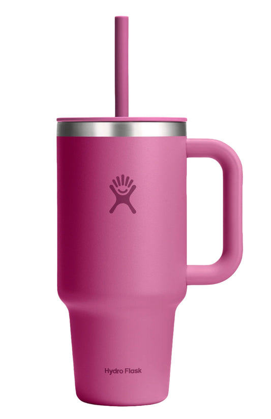 Pink stainless steel insulated mug with handle and straw, logo visible.