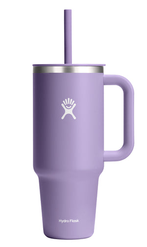 Tall, lilac-colored, stainless steel, handled tumbler with straw; brand logo and product name visible.