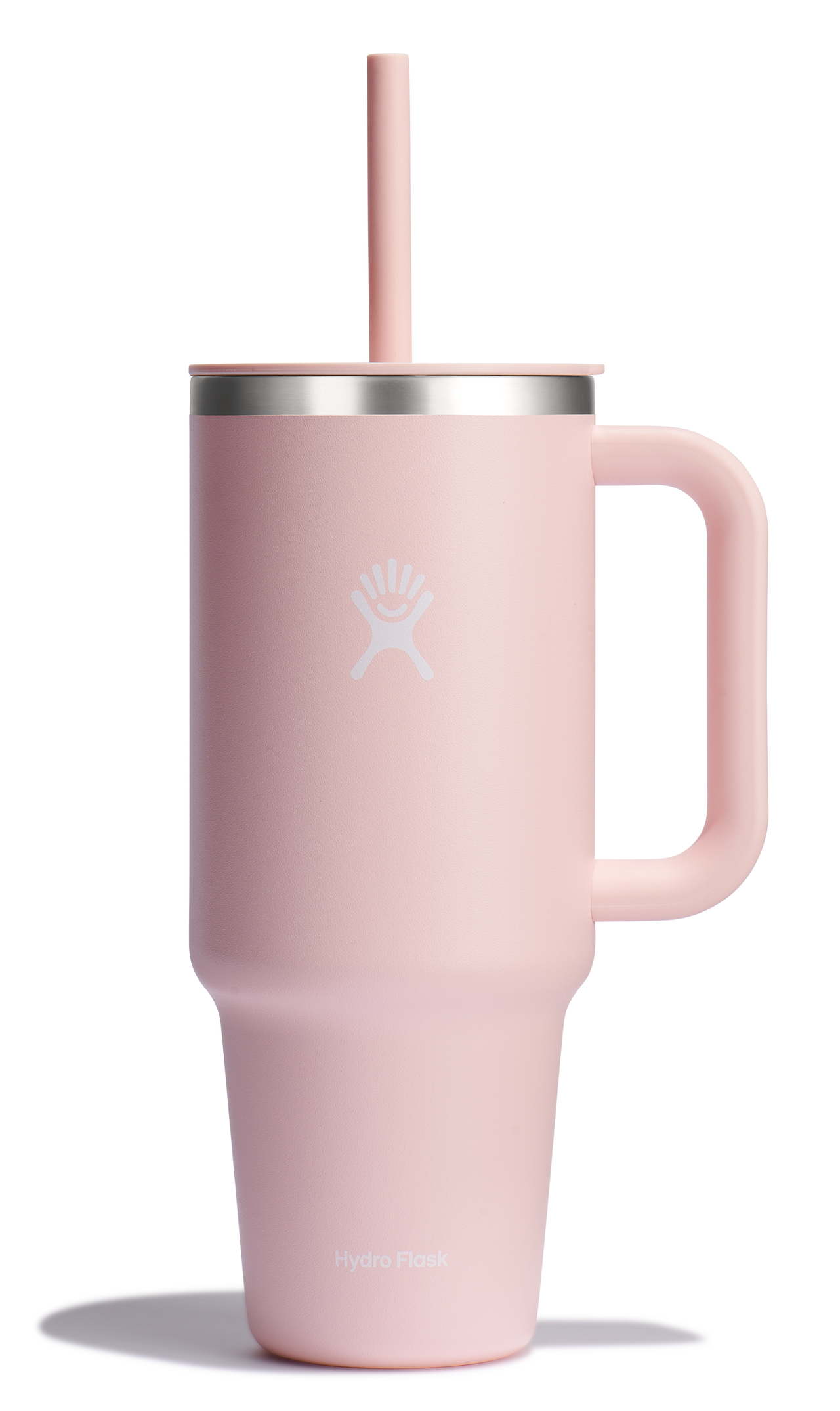 Pink mug with handle and straw.