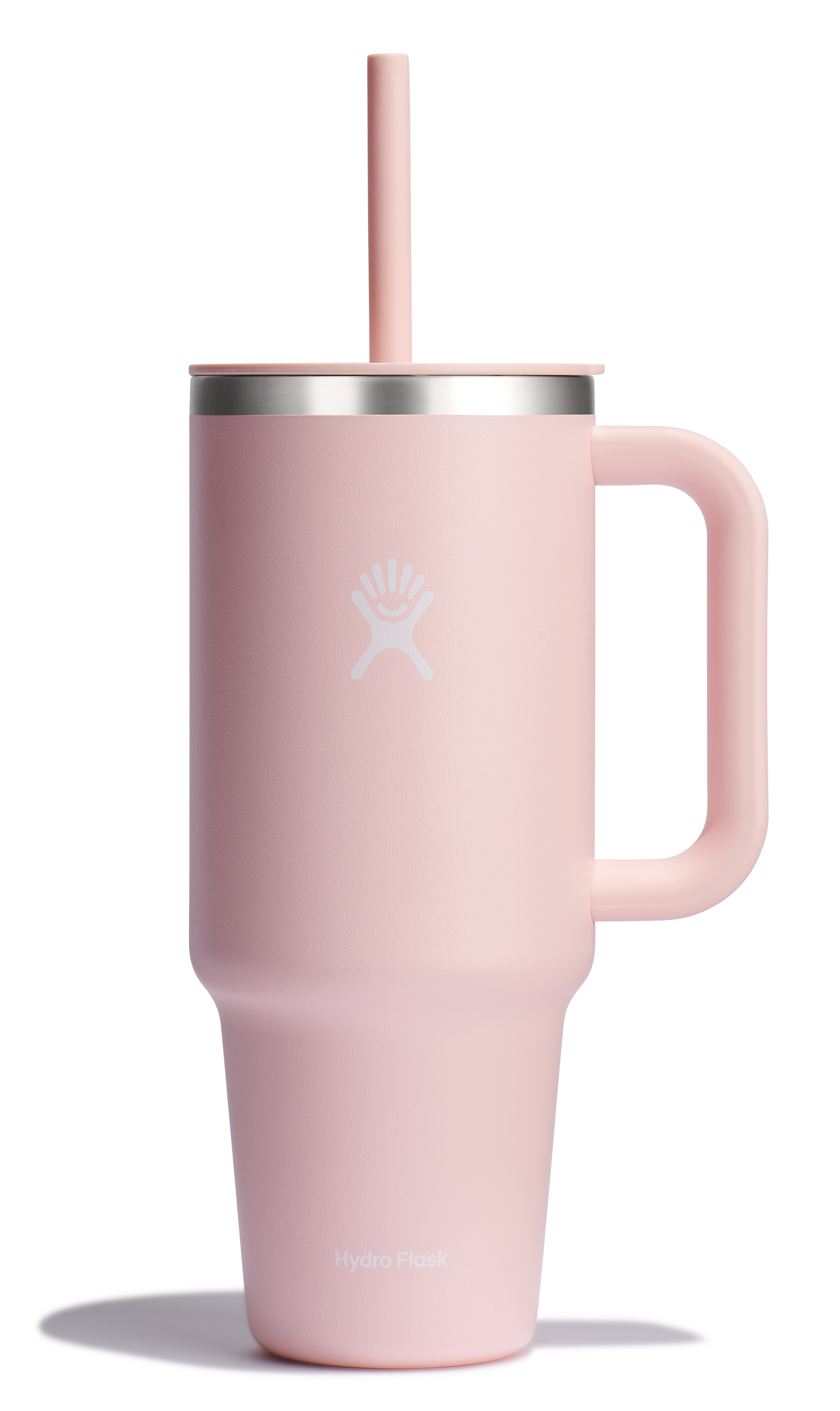 Pink mug with handle and straw.