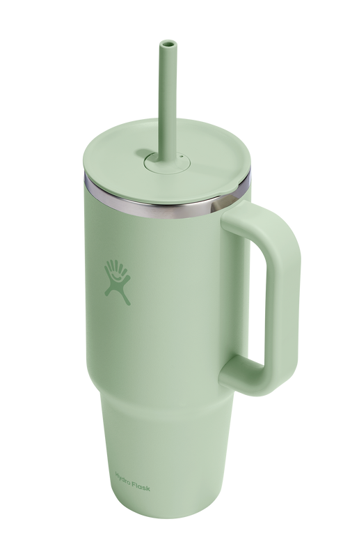 Light green travel mug with handle and straw.
