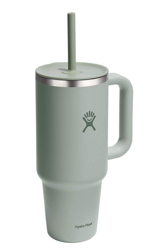 Green stainless steel tumbler with handle and straw, logo visible.
