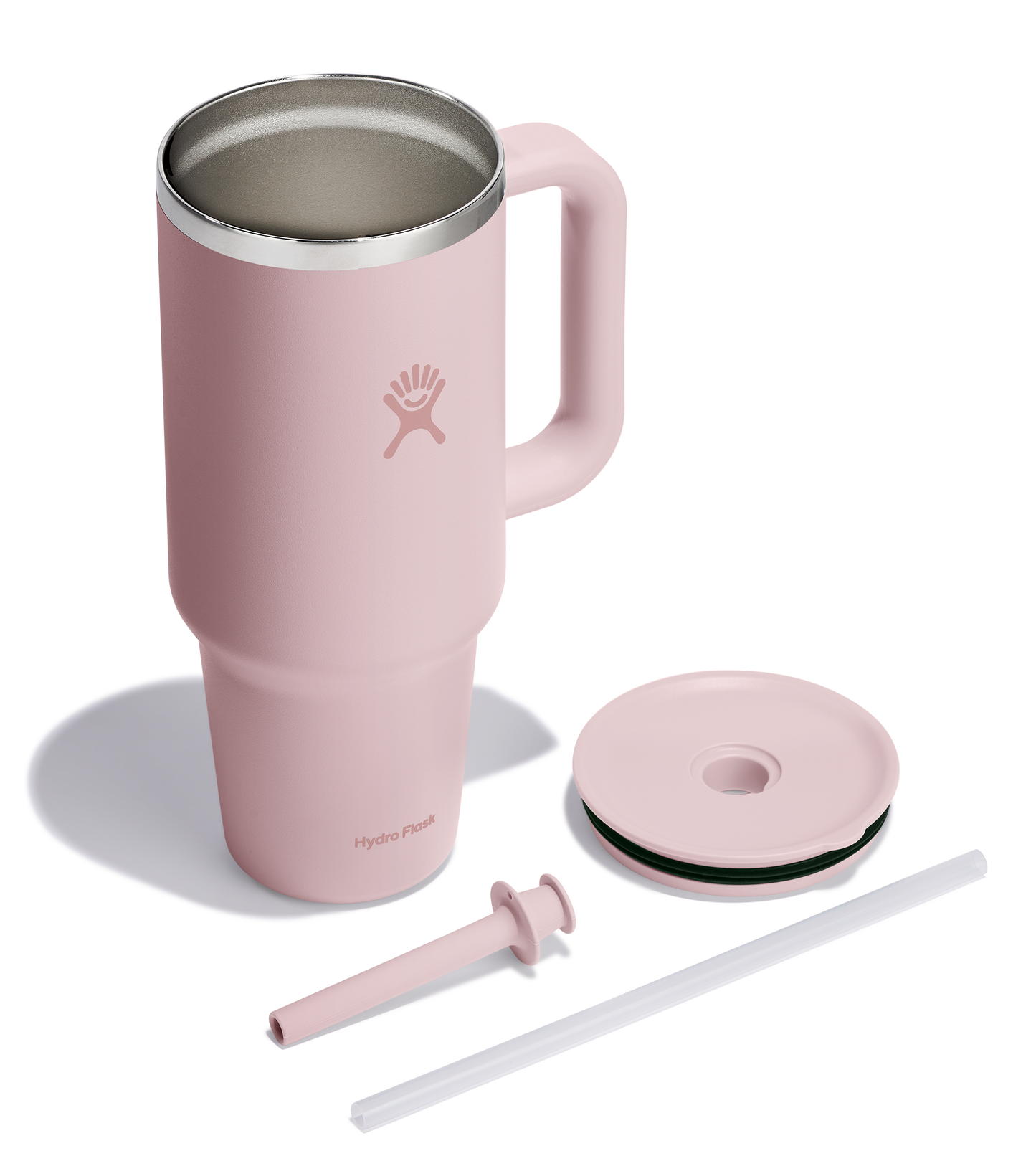 Pink handled mug with lid and straw.