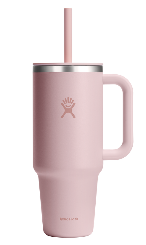 Pink stainless steel tumbler with handle and straw.