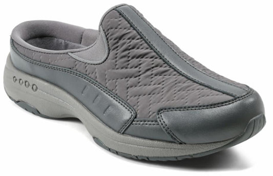 Gray slip-on shoe with quilted upper and low heel.