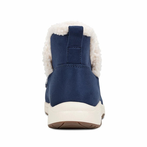 Blue ankle boot with fluffy white lining