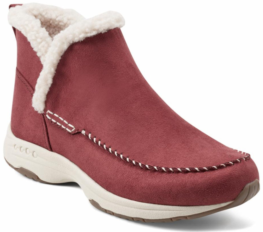 Burgundy suede bootie with faux fur trim and white stitching on a cream colored sole.