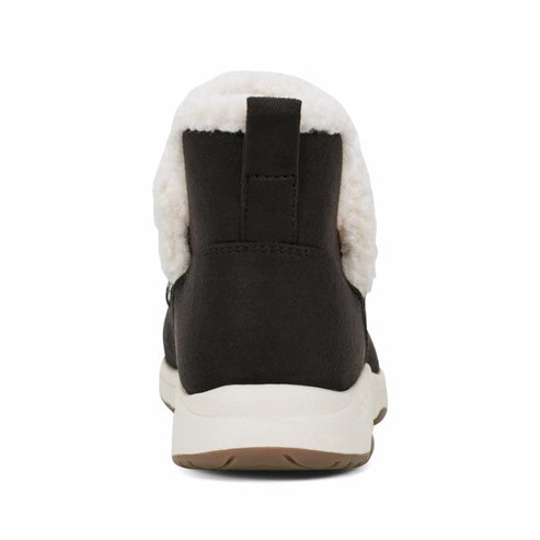 Back view of a dark brown slip-on ankle bootie with white faux fur trim and a loop at the heel.