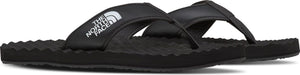Black flip-flops with white "THE NORTH FACE" logo on the strap.