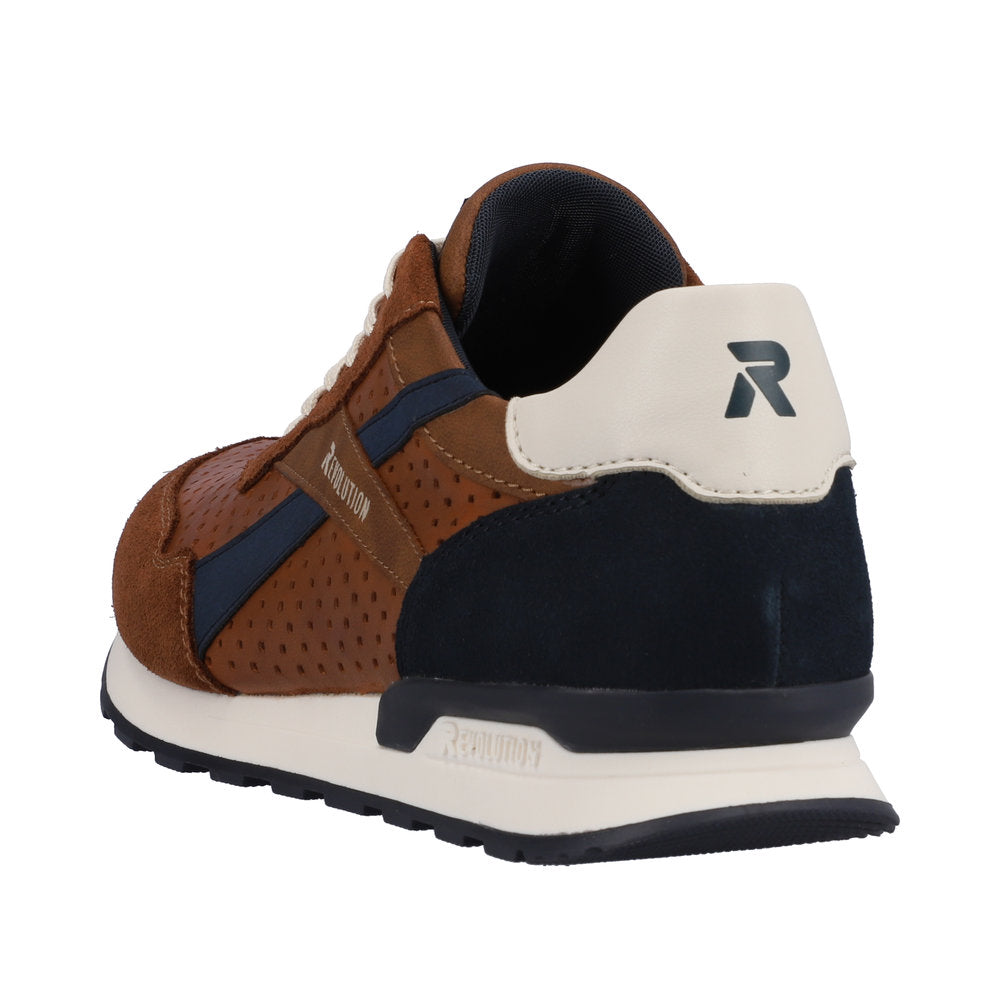 Brown sneaker with white sole, navy accents, and a white heel with dark "R".